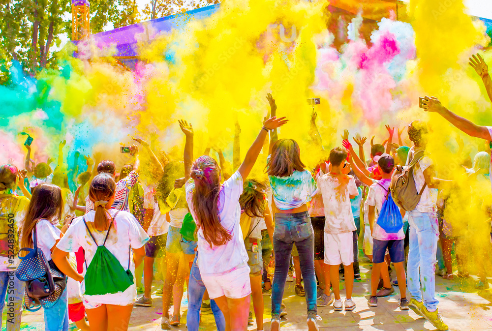 Holi Colorful festival of colored paints of powders and dust. People ...