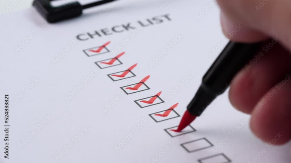 Close-up businessman tick off or marking with blue pen on checklist, checkbox, to do list box after completing task on white paper. Selective focus 4K resolution. Checklist and To Do List Concept Close-up businessman tick off or marking with blue pen on checklist, checkbox, to do list box after completing task on white paper. Selective focus 4K resolution. Checklist and To Do List Concept
