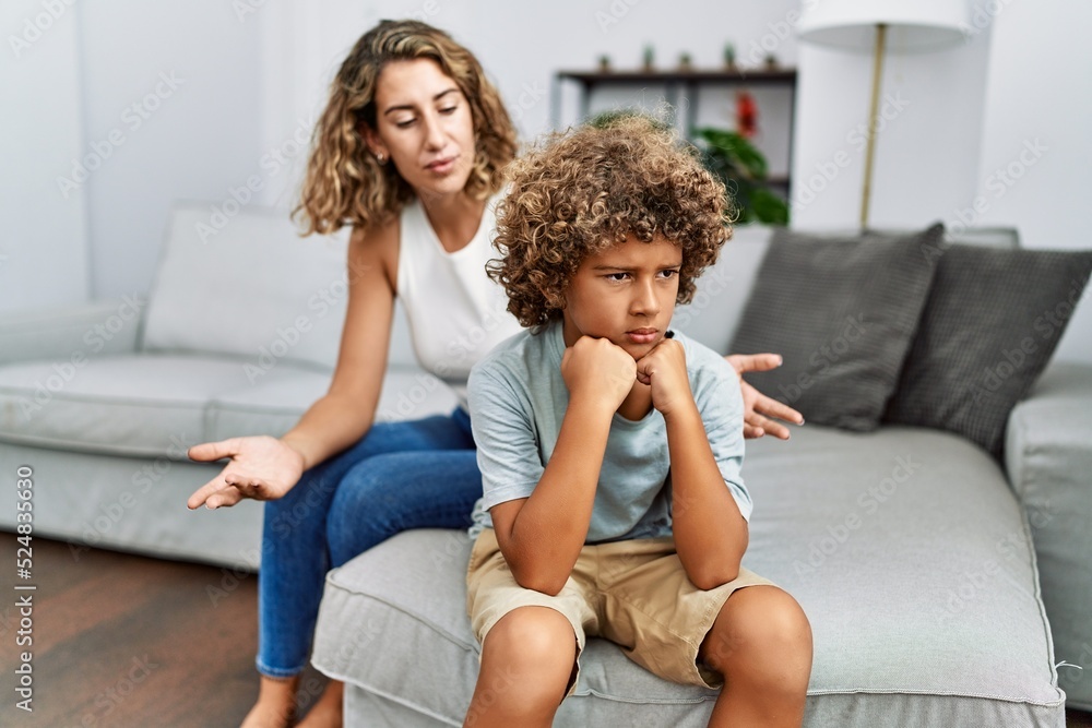 Mother and son arguing at home Mother and son arguing at home