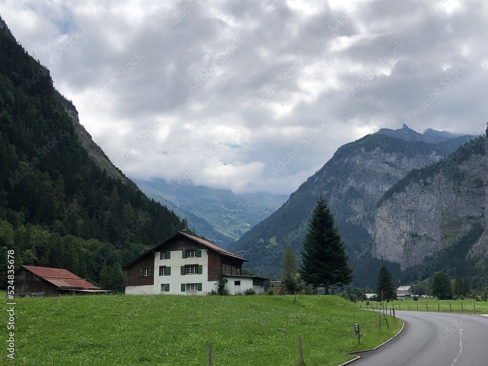Amazing Alpine valley Lauterbrunnen, Swiss Alps, Switzerland, summer 2022. Most beautiful Swiss landscape photos and top Switzerland tourist places. Alpine scenery. Village in mountains