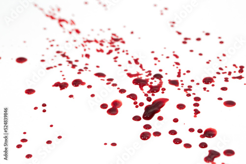 Fototapeta Naklejka Na Ścianę i Meble -  Drops of blood staining spots on a white background, medecine, drug addiction, killing