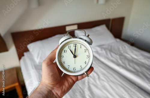 The clock shows 11 am. Time to get up.
