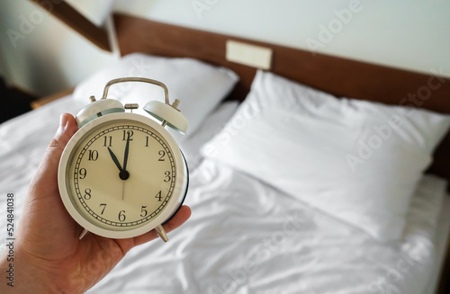 The clock shows 11 am. Time to get up.