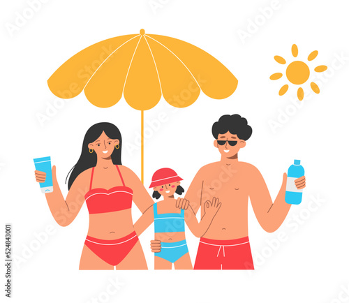 Family sun protection on the beach