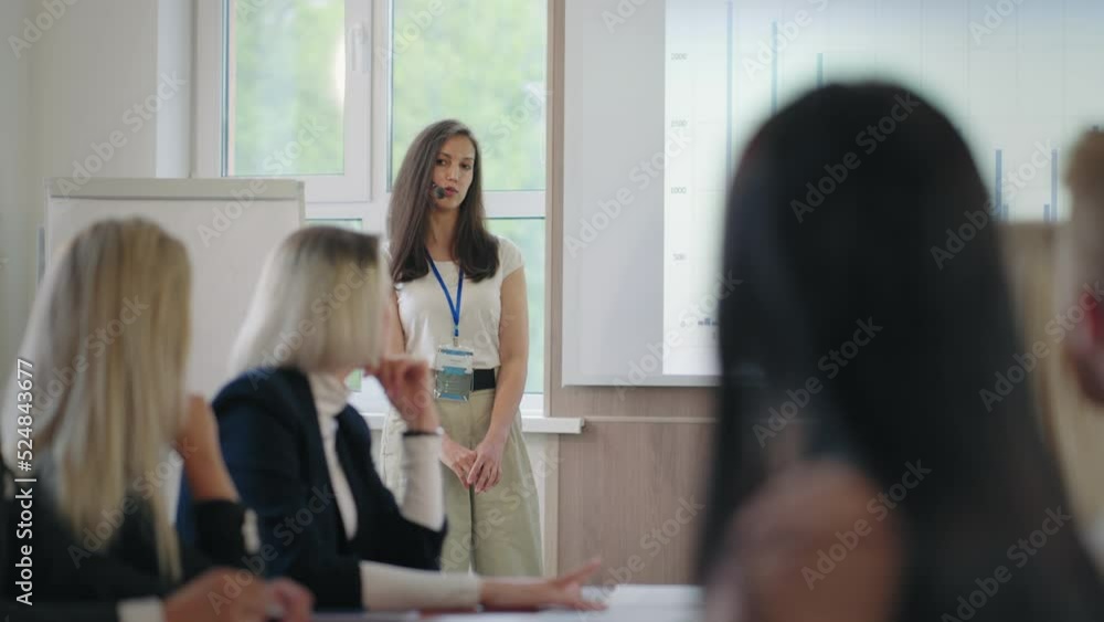 financial analyst woman is speaking in business meeting with colleagues or partners financial analyst woman is speaking in business meeting with colleagues or partners