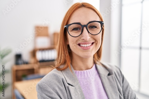 Young caucasian woman business worker smiling confident at office