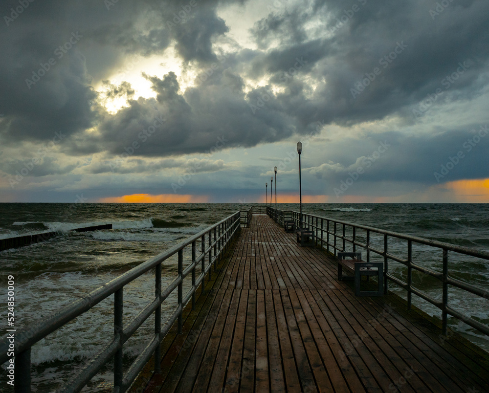 Pier on the Baltic Sea at sunset