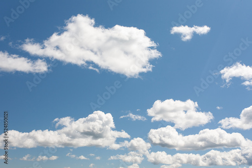 white clouds on blue sky background in the summer