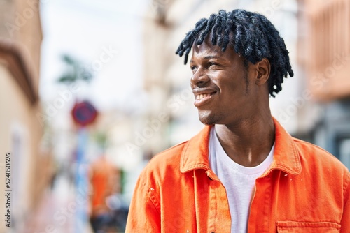African american man smiling confident standing at street
