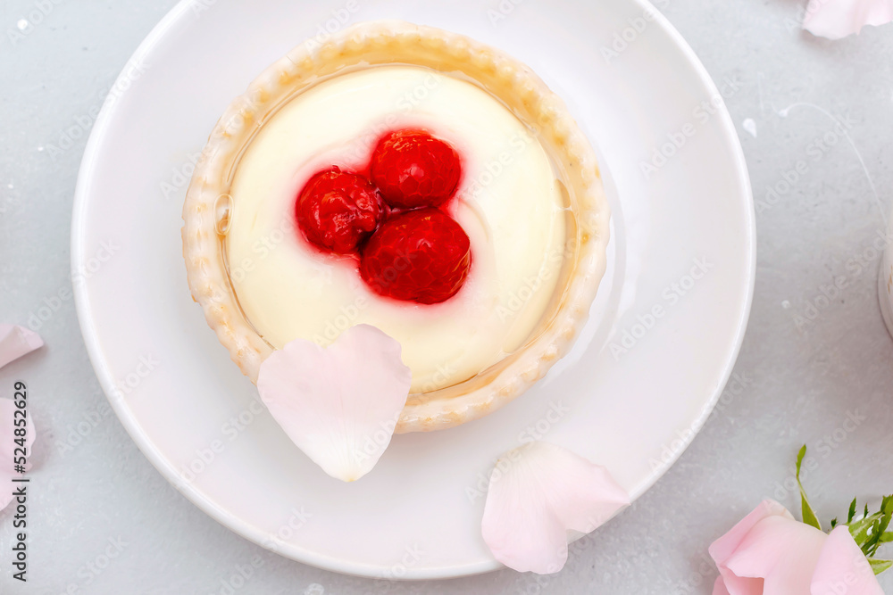 Delicious red raspberry strawberry whipped creamy tartlets,cakes.gourmet confection dessert on plate with latte coffee,milk.sweet tasty pastry baked pie cheesecake with ripe berries on gray table Delicious red raspberry strawberry whipped creamy tartlets,cakes.gourmet confection dessert on plate with latte coffee,milk.sweet tasty pastry baked pie cheesecake with ripe berries on gray table