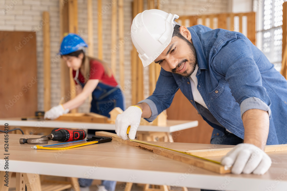 Smart and good looking Asian male carpenter. I am designing furniture to decorate my house. professionally Smart and good looking Asian male carpenter. I am designing furniture to decorate my house. professionally