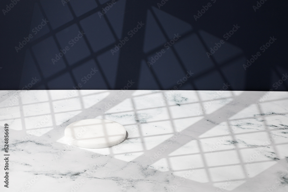 Mock up of white round little podium with window shadow. Background for product presentation. Blank, scene. Marble and Blue background. Mock up of white round little podium with window shadow. Background for product presentation. Blank, scene. Marble and Blue background.
