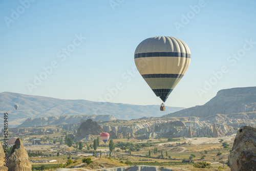 Hot air balloon flight over Cappadocia, Turkey, Goreme village, hot air balloon parade