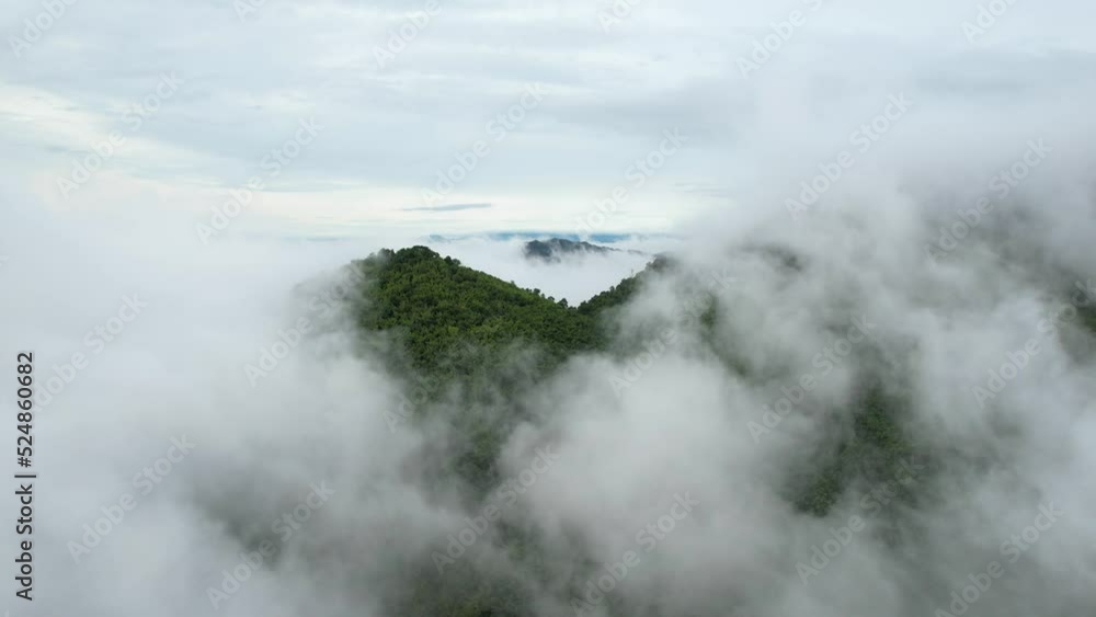High drone view of fog in rainy season over mountain for create nature video scene. 4k shooting High drone view of fog in rainy season over mountain for create nature video scene. 4k shooting