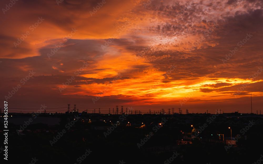 Naklejka premium red sunset over the city
