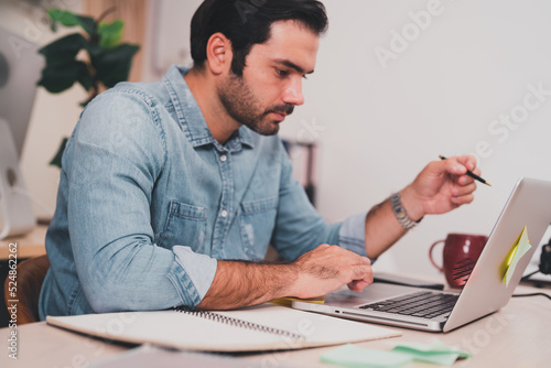 Wallpaper Mural entrepreneurial executives sitting smiling. business manager lifestyle Indoor self-confidence.professional male technical young white computer company work laptop Torontodigital.ca