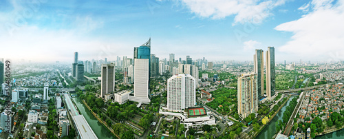 Sudirman train station surrounded by urban buildings