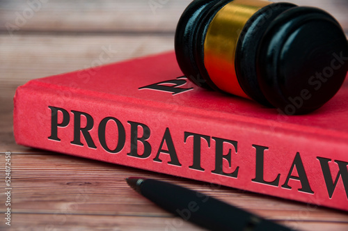Probate law book with gavel on top. Legal and law concept photo