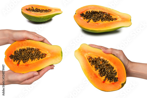 Papaya fruit isolated on a white background in woman hands. Half papaya.