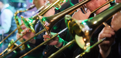 Фотография The musical instrument is a trumpet in the hands of a musician
