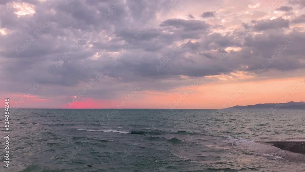 Dramatic sea sunrise. Burning sky and shining golden waves. Dramatic sea sunrise. Burning sky and shining golden waves.