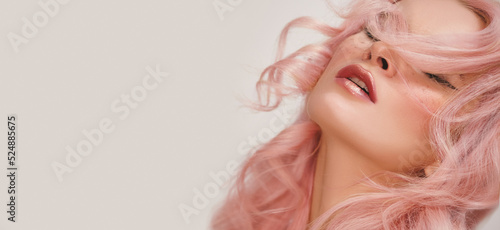 Soft-Girl Style with Trend Pink Flying Hair, Fashion Make-up. Blond Woman Face with Freckles, Blush Rouge, Rose Hair