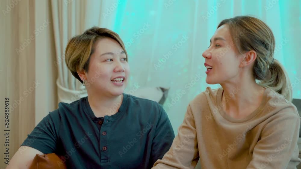 4K, Two Asian couples chat happily as they settle into their new home together after their marriage. Love and friendship of LGBTQ couples 4K, Two Asian couples chat happily as they settle into their new home together after their marriage. Love and friendship of LGBTQ couples