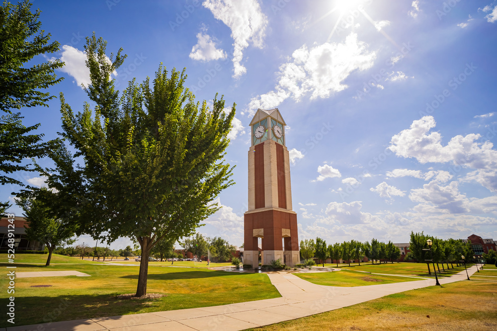 Sunny view of the Freede Centennial Tower of Oklahoma Christian University