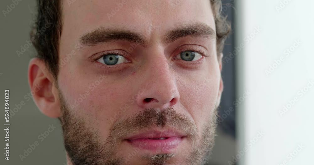 Headshot of a young Caucasian man, looking at the camera with confidence sincere emotions, expressing his personality and individuality. Close-up. Headshot of a young Caucasian man, looking at the camera with confidence sincere emotions, expressing his personality and individuality. Close-up.