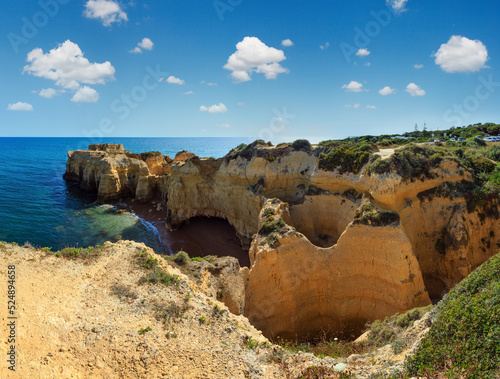 Atlantic rocky coast view (Algarve, Portugal).