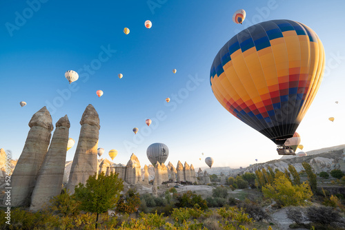 beautiful scenery flight of balloons in the mountains of Cappadocia in love valley