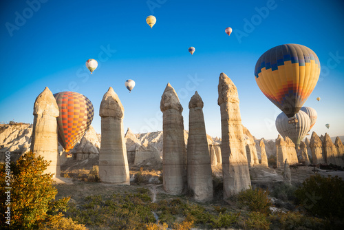beautiful scenery flight of balloons in the mountains of Cappadocia in love valley