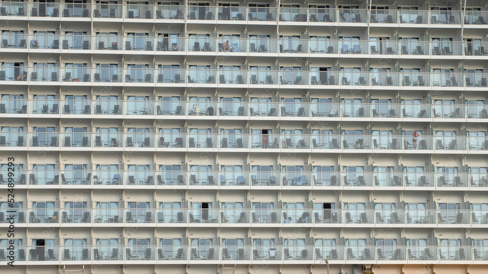 Balconies of the cabins of a large cruise ship moored in the port Balconies of the cabins of a large cruise ship moored in the port