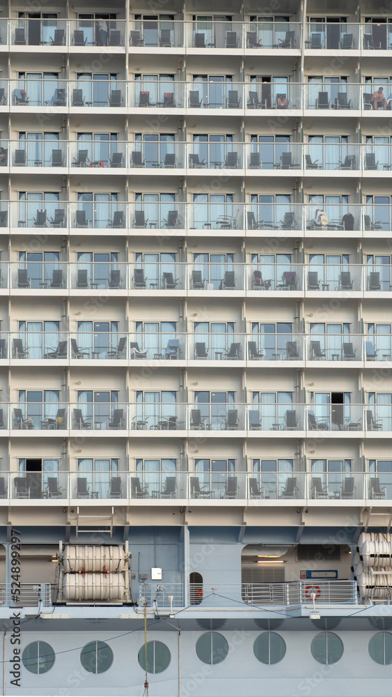 Balconies of the cabins of a large cruise ship moored in the port Balconies of the cabins of a large cruise ship moored in the port