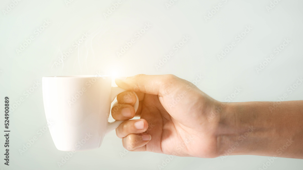 Man holding a white coffee cup and smoke from glass. Man holding a white coffee cup and smoke from glass.