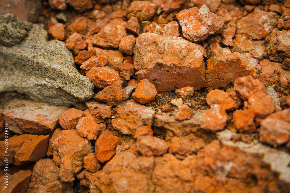 Red brick wall. Remains of a demolished house. Red brick wall. Remains of a demolished house.