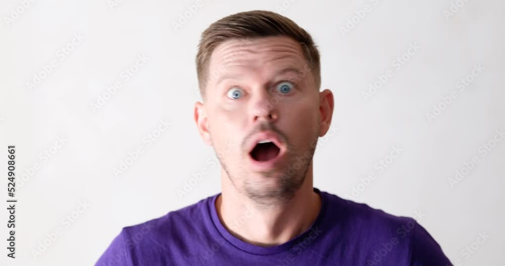 The man opened his mouth and shook his head The man opened his mouth and shook his head
