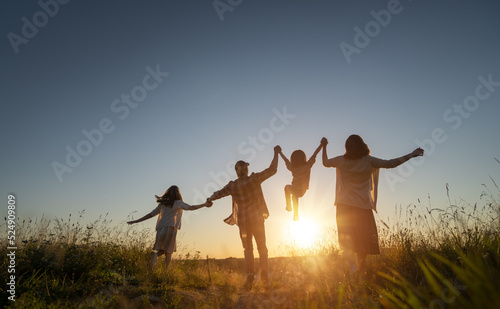 Happy family in the park photo