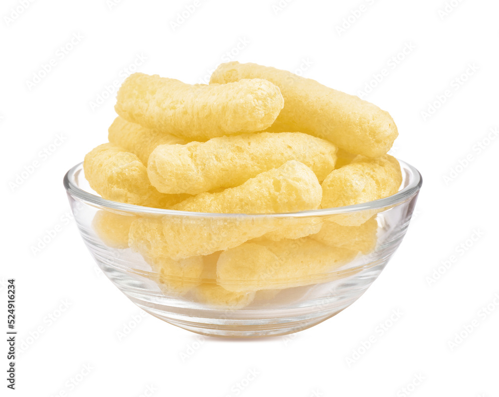 Glass bowl of sweet corn sticks isolated on white