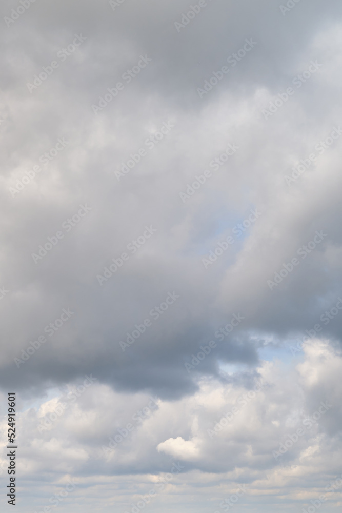 White cumulus clouds in the blue sky. Bright beautiful sky, copy space background White cumulus clouds in the blue sky. Bright beautiful sky, copy space background