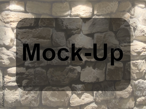 Mock-up vor beleuchteter Steinwand