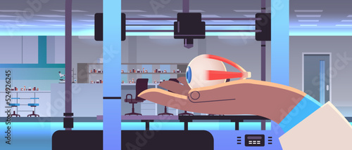 researcher hand holding eyeball model printed on 3d bio printer medical printing of human transplantation organ