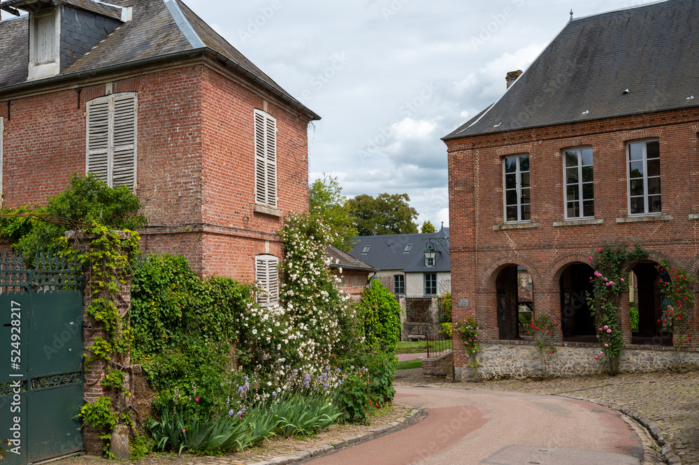 One of most beautiful french villages, Gerberoy - small historical village with half-timbered houses and colorful roses flowers, France One of most beautiful french villages, Gerberoy - small historical village with half-timbered houses and colorful roses flowers, France