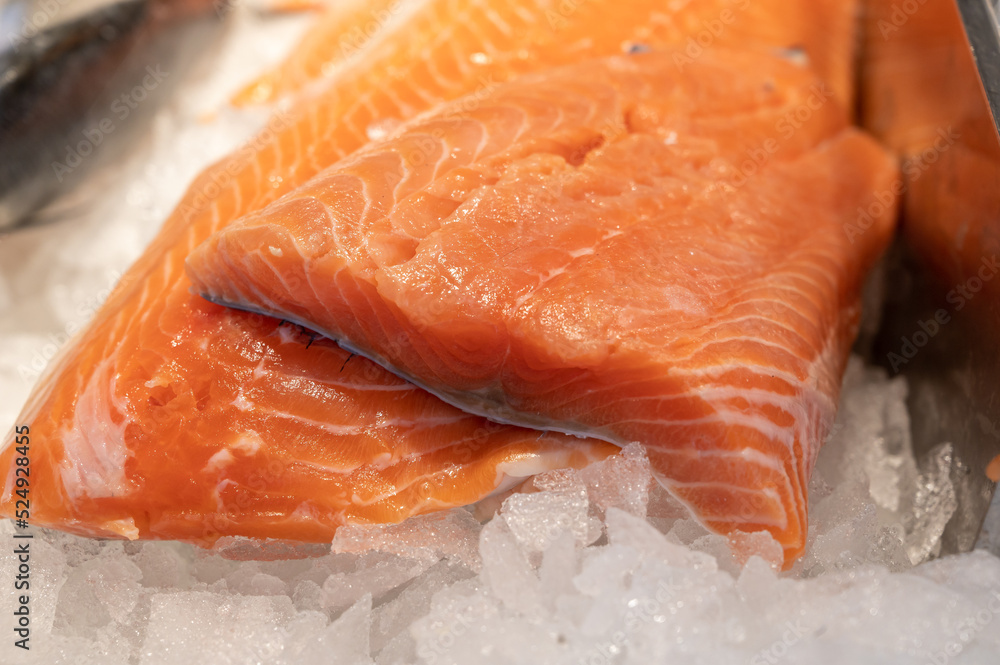 Organic wild scottish fish salmon cleaned on ice on market