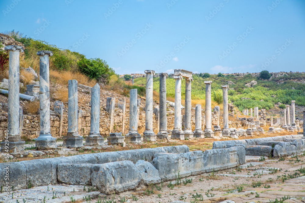 Roman ruins. Colonnaded street of city Perge. Ancient Greek colony from 7th century BC, conquered by Persians and Alexander the Great in 334 BC. Turkey Roman ruins. Colonnaded street of city Perge. Ancient Greek colony from 7th century BC, conquered by Persians and Alexander the Great in 334 BC. Turkey