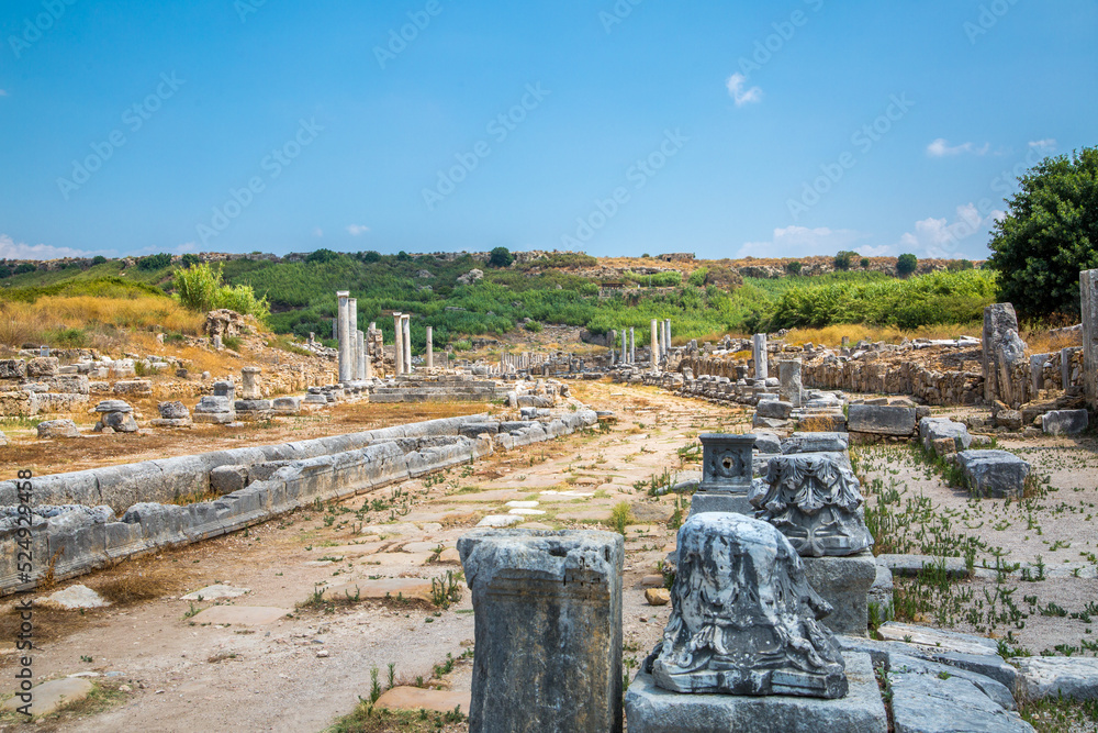 Perge, Colonnaded street and a water channel runs in the middle of the street from the Nymphaion fountain. Foot bridge. Dated by period of the Emperor Hadrian 334 BC. Turkey