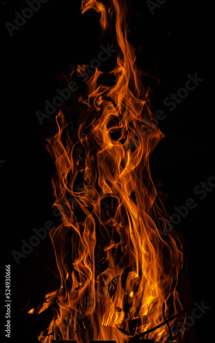 Bonfire flame on black isolated background