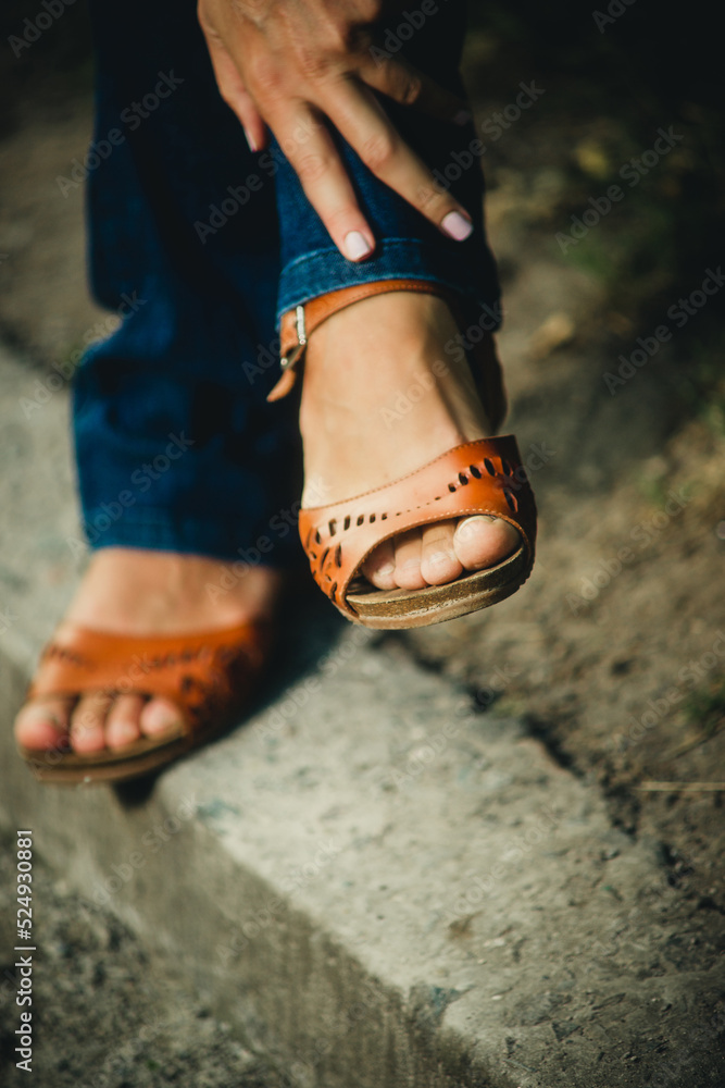 female legs in sandals close-up