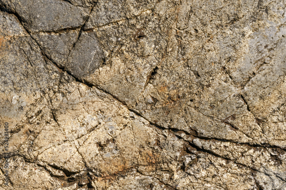 Naklejka premium Texture of stone rock. Cracks in stone surface.