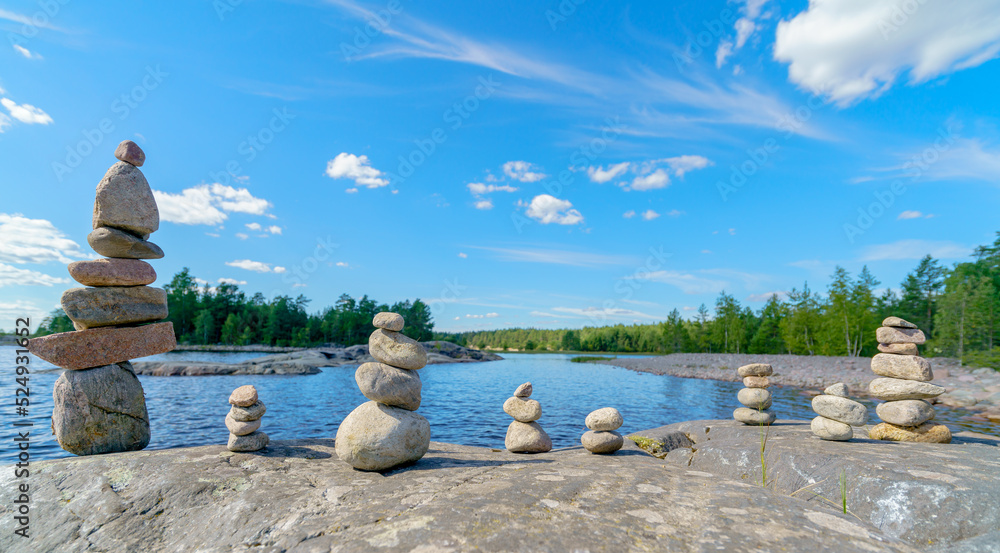 Pyramid of stones. Unstable balance of stone objects. Idyllic state of nature. Pyramid of stones. Unstable balance of stone objects. Idyllic state of nature.